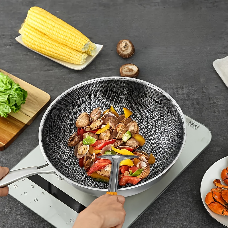 stainless steel chefs pan non stick honeycomb surface scratch resistant heat resistant ergonomic one handed design ideal for stir frying with versatile cookware for home and outdoor use details 3