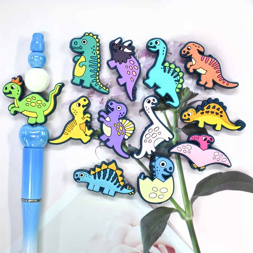 

Set Of 12 Plastic Beads Featuring A Dinosaur Theme, Including Purple And Designs, Ideal For , Keychains, And Decorative Buckles; Note That No Pen Is Included.