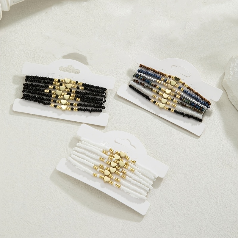 E-shop 21-teiliges Set, Armband im Vintage-Stil mit dunklen, gemischten Rocailles-Perlen einem mehrschichtigen Herz-Anhänger, geeignet für