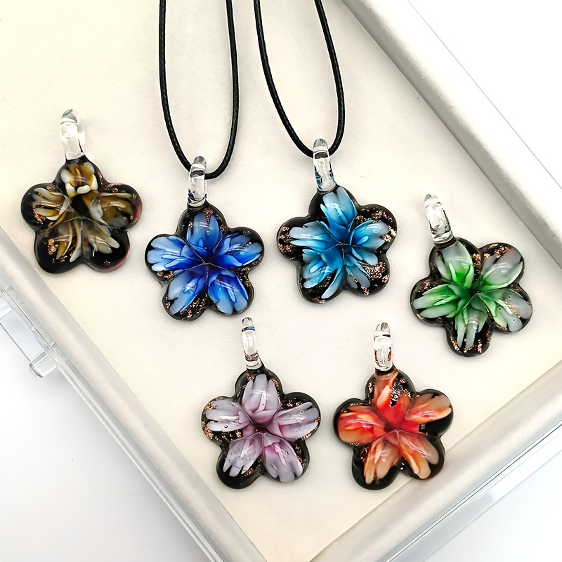 Glass Pendant Necklace on Floral Background for Daily Occasion