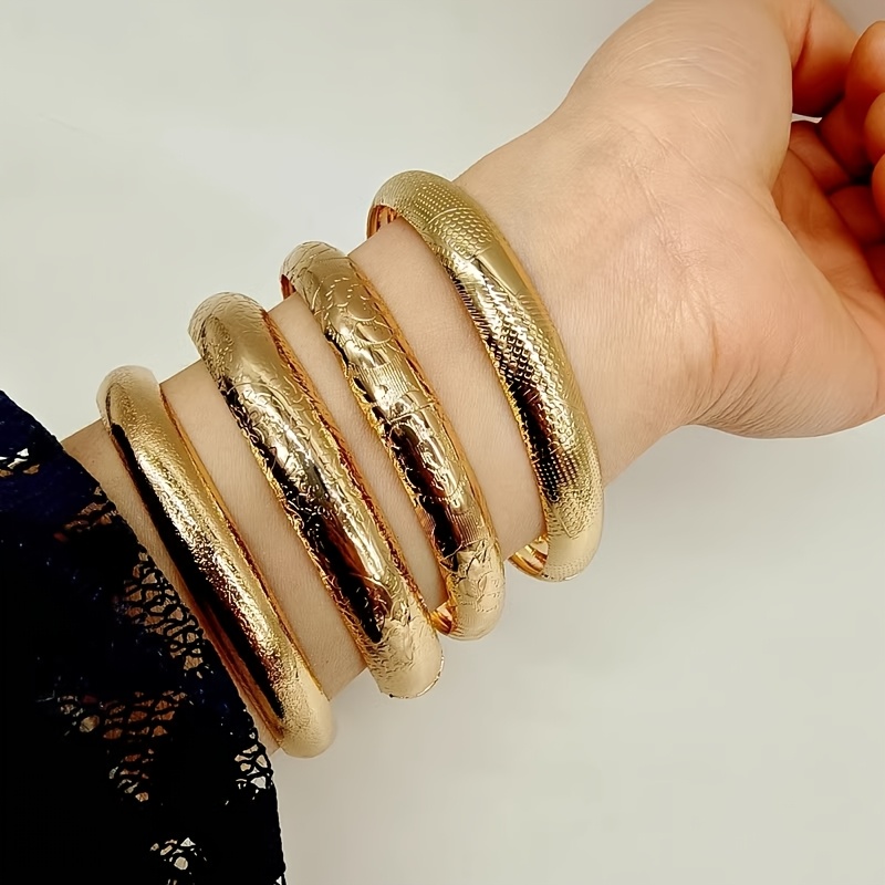 

Set Of 4 Vintage Floral Patterned Wide Bangles, Metallic Gold-plated Fashion Stacking Bracelets For Women, Jewelry.