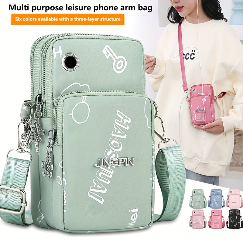 

Multi-functional Fashion Arm Bag, Nylon Leisure Phone Holder With Adjustable Strap, Travel & Sport Essential Accessory With Zipper Pockets And Keychain Accents