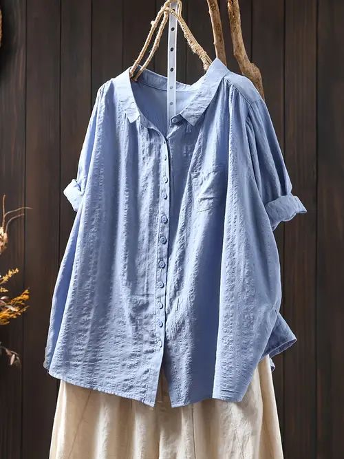 a new summer womens blouse with a literary vintage style featuring a lapel collar and quarter sleeves loose and large size exuding a casual and elegant charm