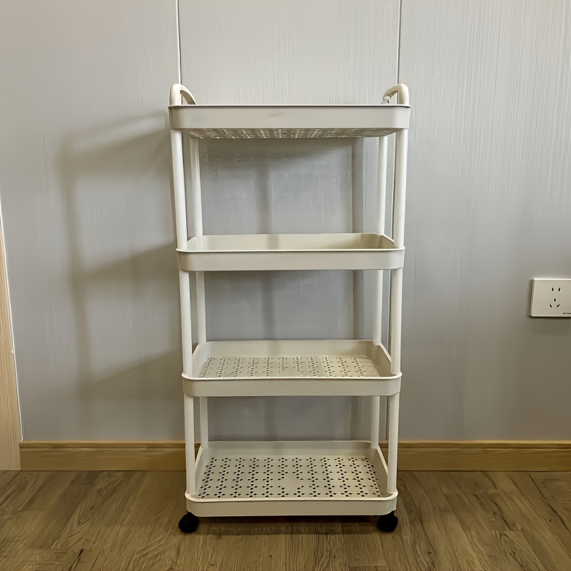 suitable for 12 months and up heavy duty 4 tier rolling storage cart all terrain wheel mobile organizer compact space saving design sturdy plastic construction suitable for home   garage requires simple assembly multi layer Product details 3