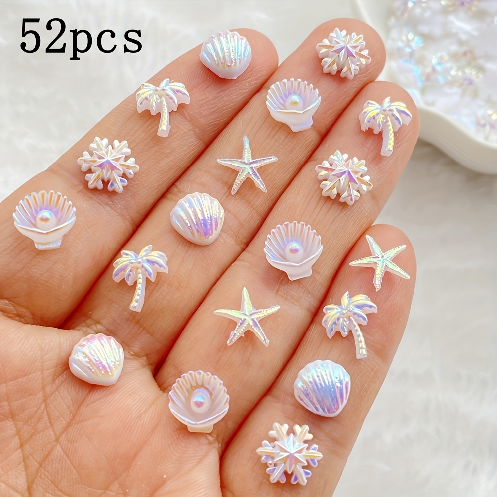 A Collection Of 52 102 Assorted Adorable Mini White Starfish, Shells, Christmas Snowflakes, And Flat-backed For Nail Rhinestones - Ideal For Nail Art Embellishments And Holiday Craft Decorations