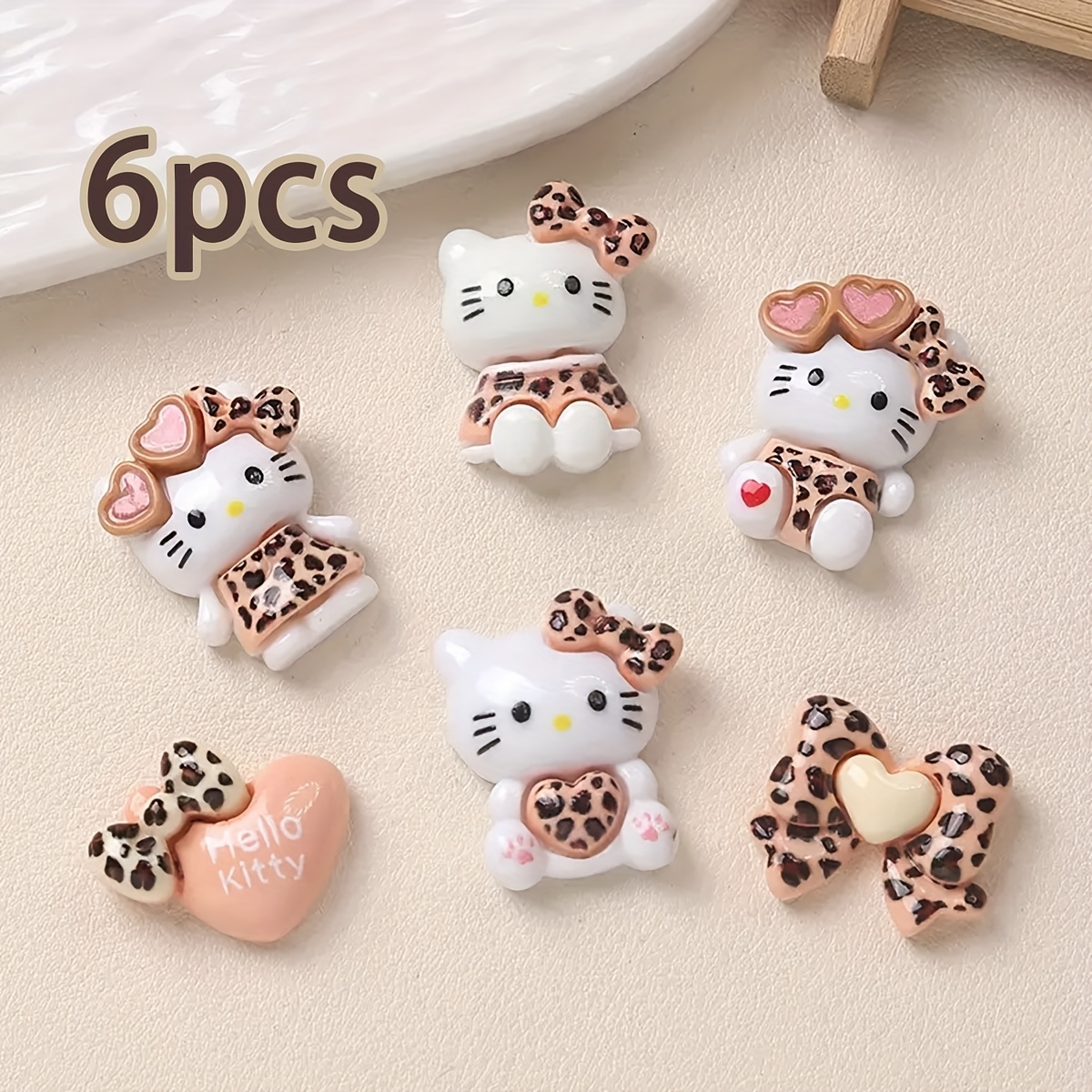 E-shop 6-teiliges Hello Kitty Schuh-Accessoire-Set, Schuhdekorations-Verzierungen, Sandalen- und Hausschuhschmuck, perfektes Geschenk für verschiedene