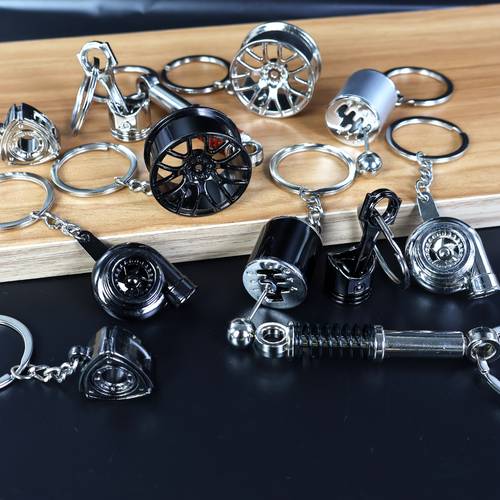 Artikelbild 6er-set auto- -schlüsselanhänger, lässiger stil mit rad, turbolader, schaltknauf, kolben, stoßdämpfer, schwungrad, geschenkkombi-pack | mechanische charme schlüsselringe | zinklegierung schlüsselanhänger, autoschlüsselanhänger für männer, männliche schlüsselanstecker