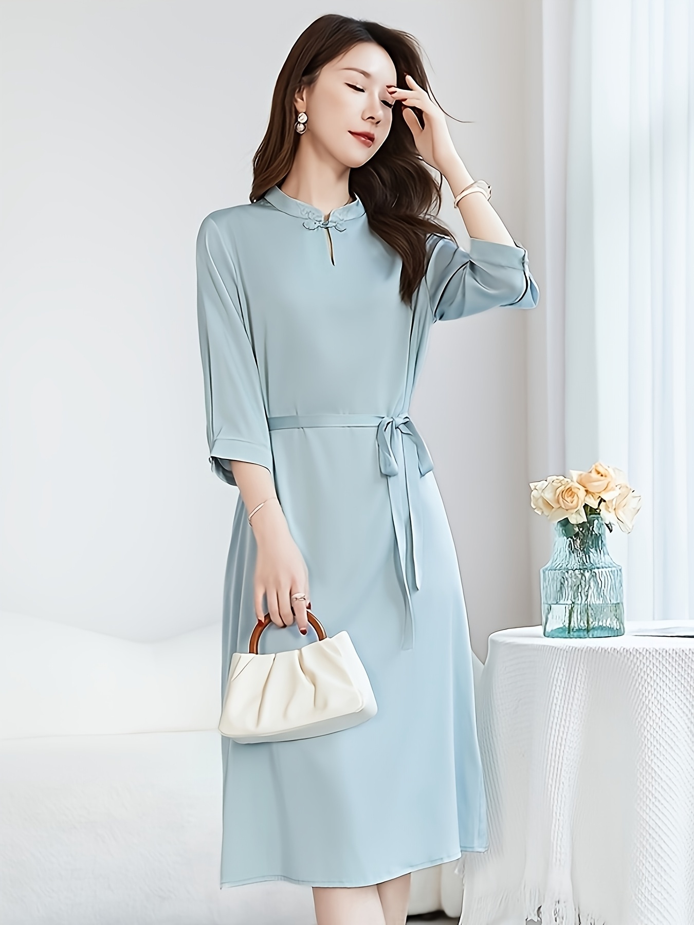 a beautiful style dress a stand collar waist tie