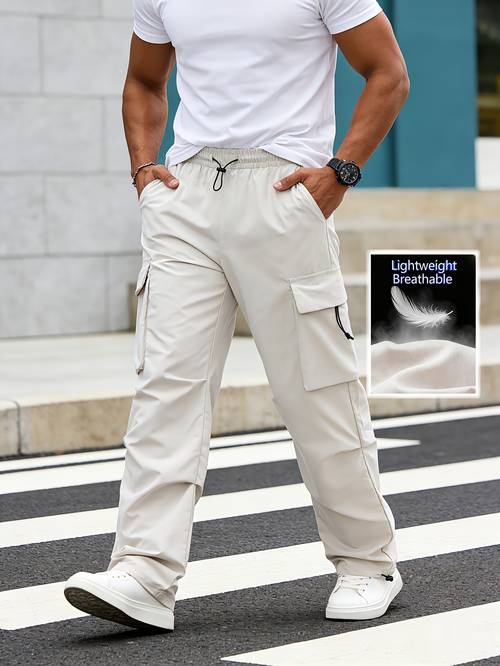 lightweight breathable cargo trousers for men featuring an elastic waistband with a drawstring loose wide legs multiple pockets and quick dry fabric ideal for outdoor hiking streetwear everyday use and fashion