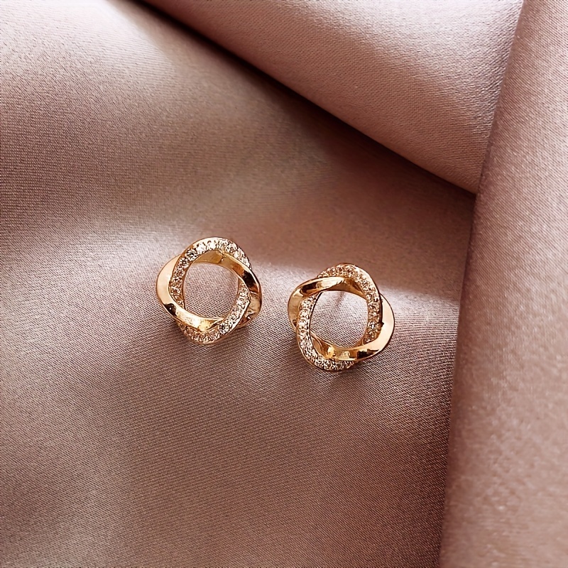 Alloy Circle Stud Earrings with Rhinestone Detailing and Stainless Steel Post