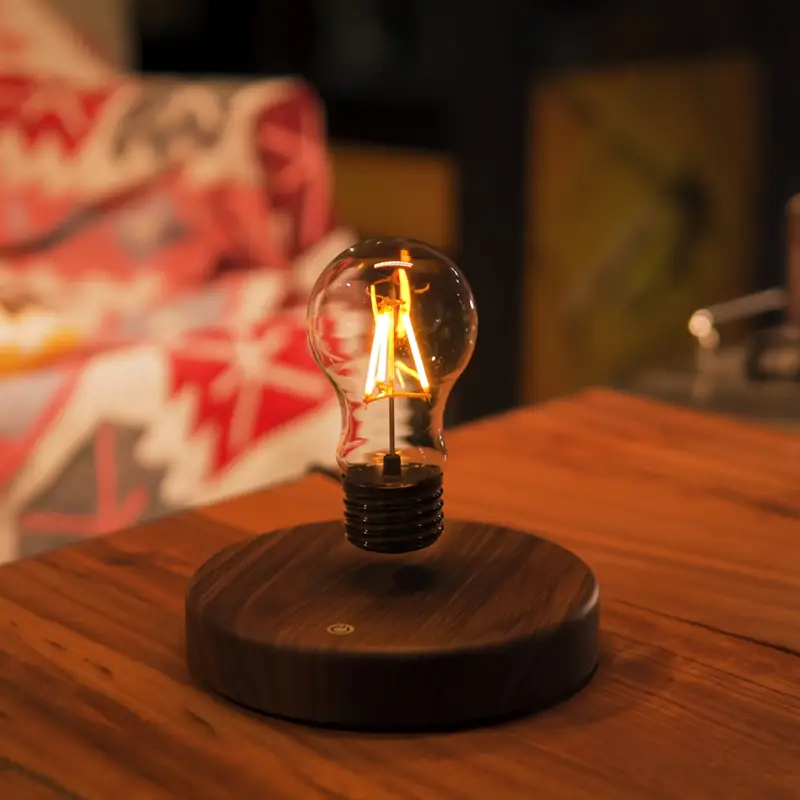 wholesale price abs plastic magnetic floating light bulb warm yellow led table light for room office details 6