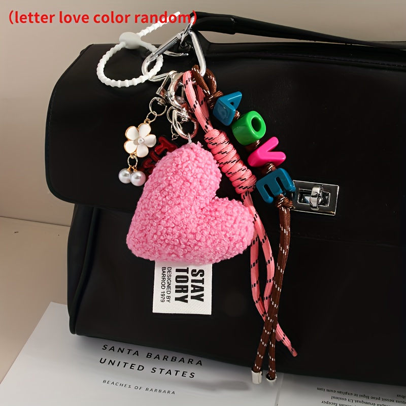 Image of Stylish, Sweet And Edgy Charm A Sophisticated Bag Accessory, Keyring Charm Or Lanyard. The Colour Of The Love Letters Is Random