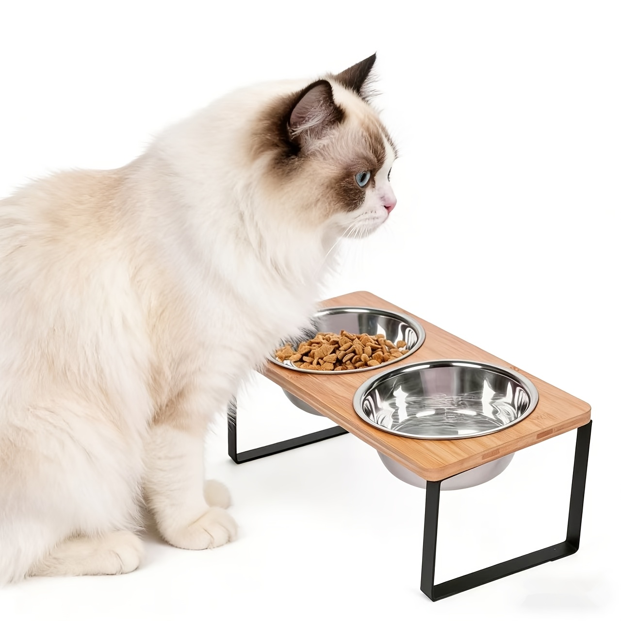 Image of Elevated Cat Feeder With 2 Stainless Steel Bowls, Designed For Indoor Pets, Featuring A Cute Metal Base And A 15° Tilt To Prevent Vomiting