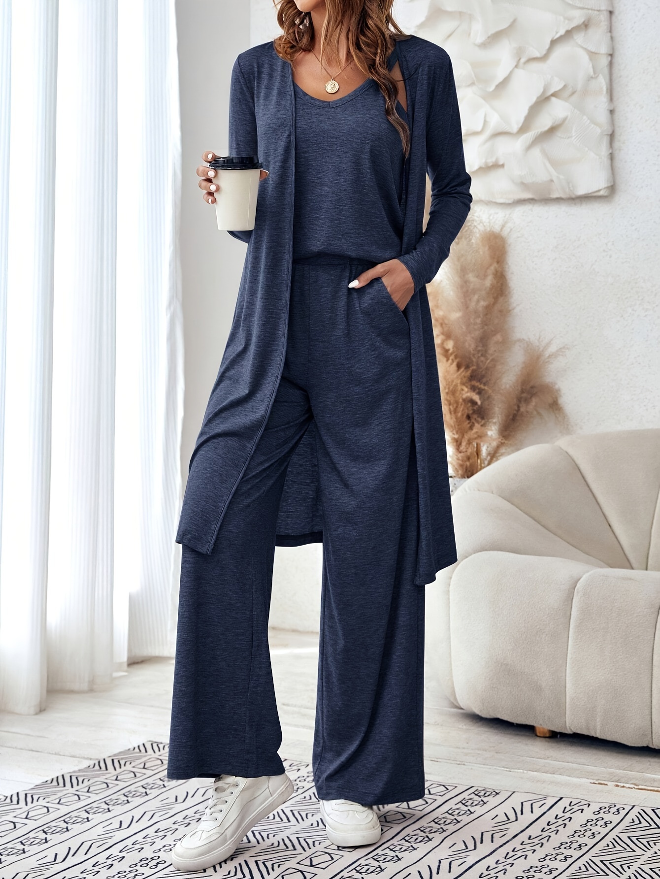 Model wearing the complete solid color 3-piece set with strap top, pants, and lightweight cardigan