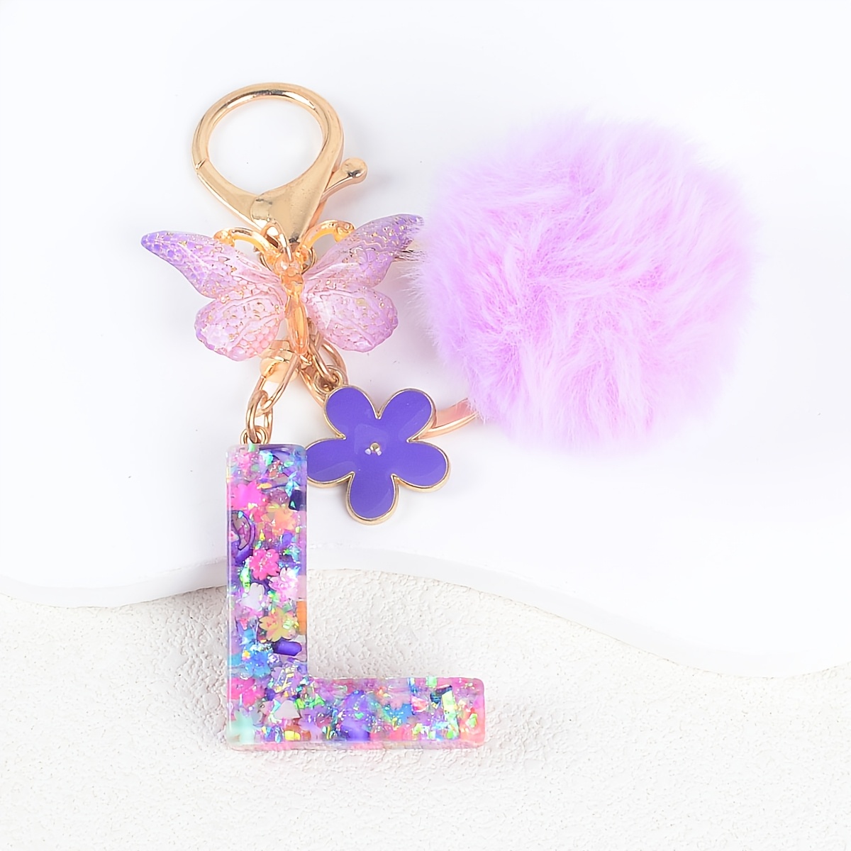 TEMU 1pc Porte-clés Tendance en Résine avec Initial, Pompon, Papillon et Floral en Anglais, Cadeau de Fête pour Femmes et Filles, Sac à Dos, Voiture,