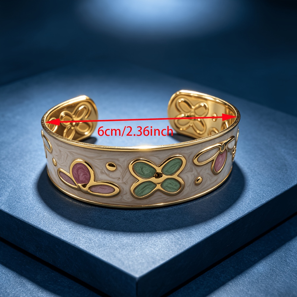 Women's Embossed Floral Enamel Golden Tone Open Cuff Bangle