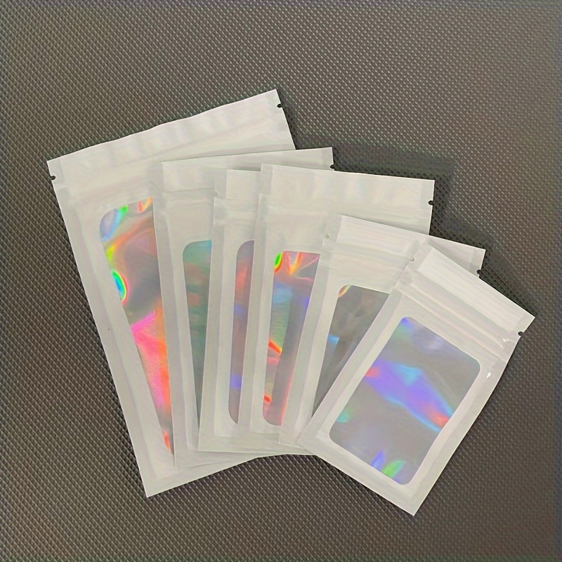 

100pcs, Laser Color Frame White, Holographic Symphony Aluminum Foil Bag Seal Pocket, Transparent 1 Side White Phone Case Data Cable Packaging Bag, Jewelry Sub-packaging Bag Plastic Bag