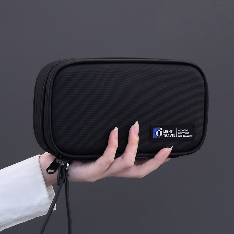 E-shop Eine vielseitige elektronische Aufbewahrungstasche für Reisen, entwickelt, um Kabel, Kopfhörer und zu speichern, mit einem tragbaren