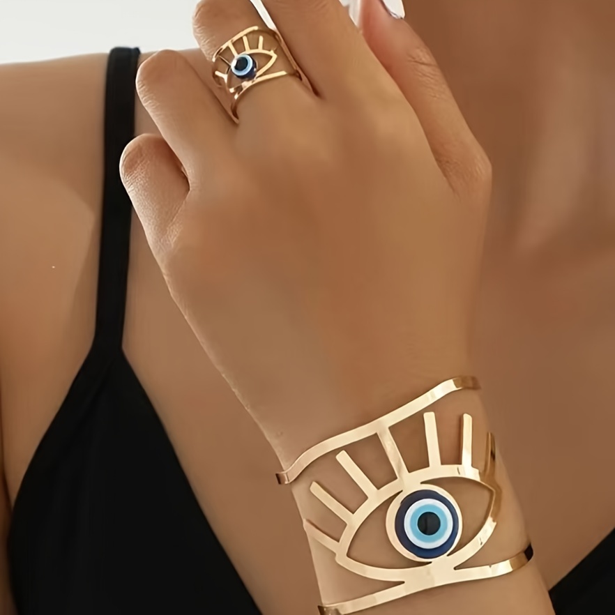 

Bracelet ouvert d'œil en ton doré élégant - Parfait pour le port quotidien