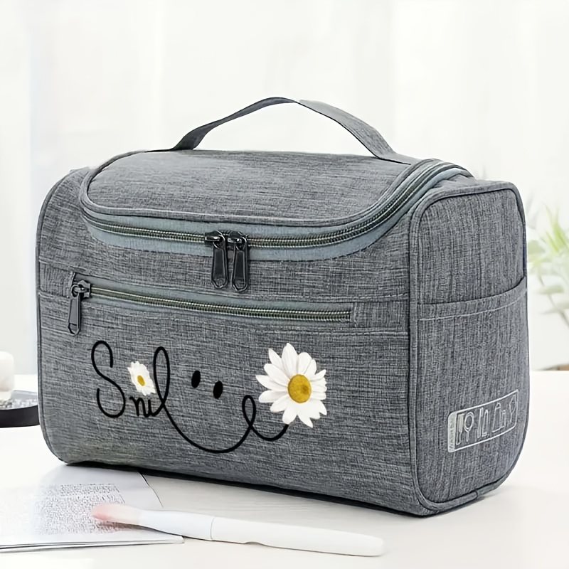   daisy multifunctional storage bag with multiple compartments   travel toiletries and makeup it allows for organized storage of personal care items beauty products and small essentials the top handle   it easy to carry