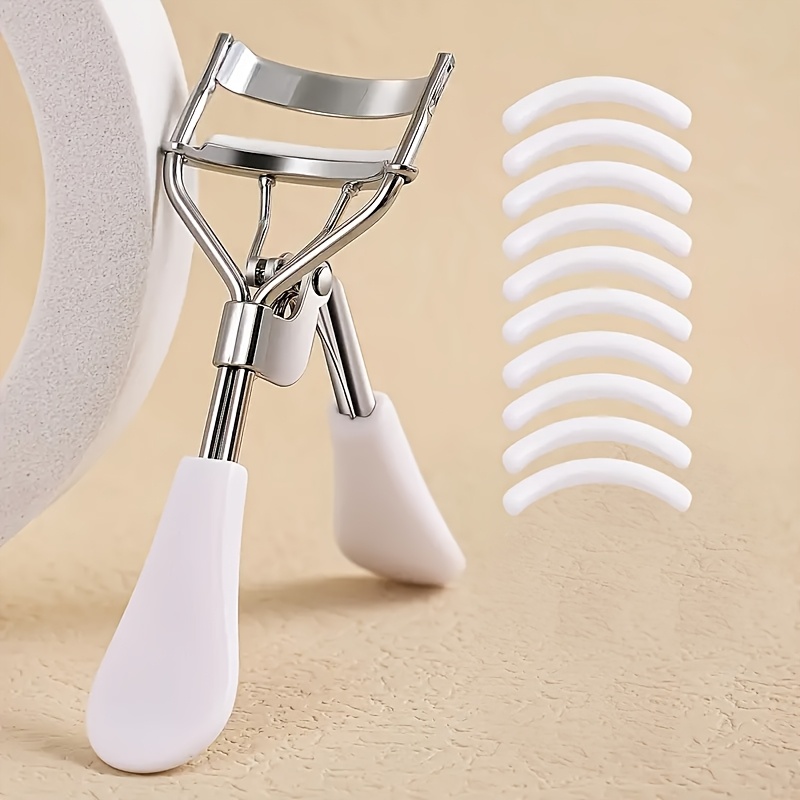   eyelash curler with 10 replacement pads designed for long lasting use making lashes   and fuller   and safe for   this eyelash curler shapes effortlessly without   the skin