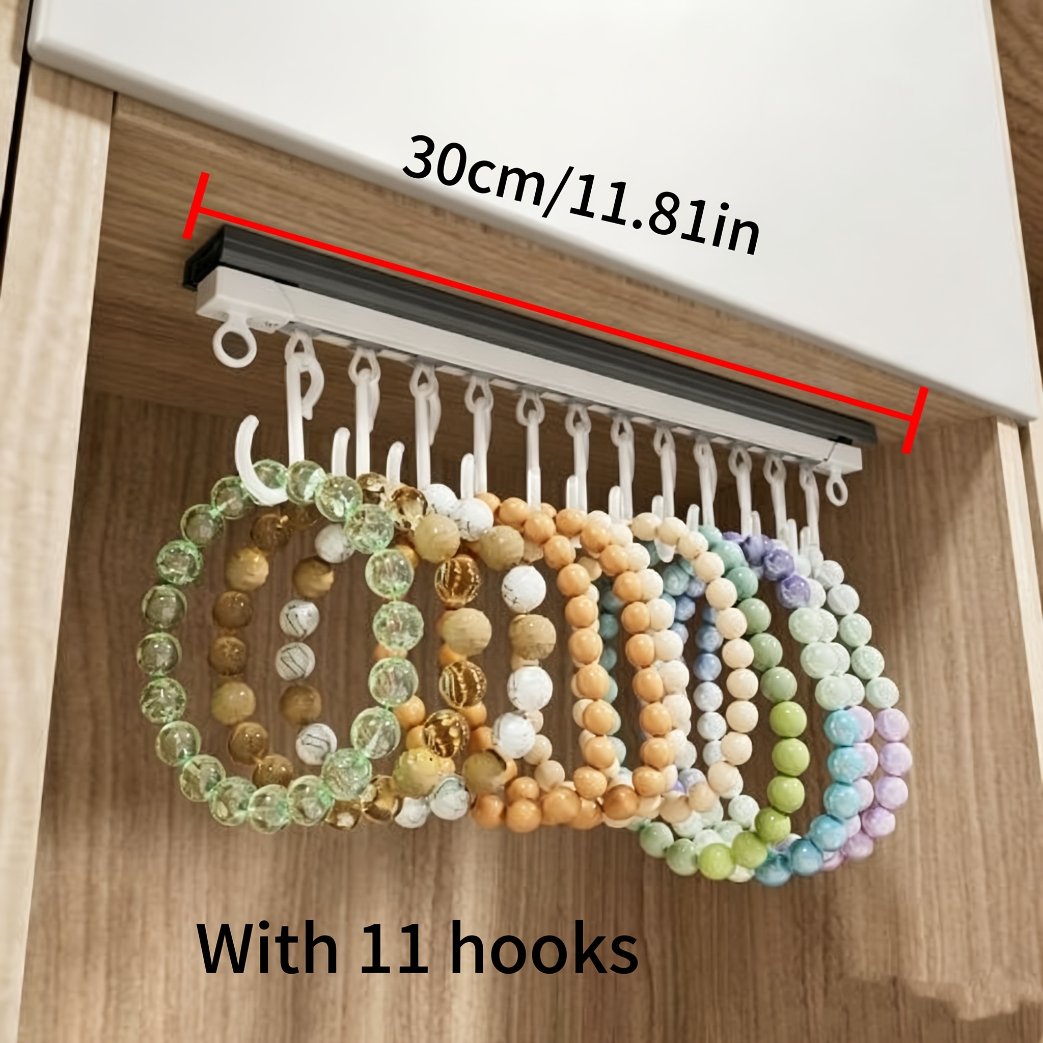 TEMU 1pc No-drill Sliding/roller Storage Clip With 11 Hooks, Auxiliary Hooks/home Hooks/can Hang Bracelets/watches/hair Ties/data