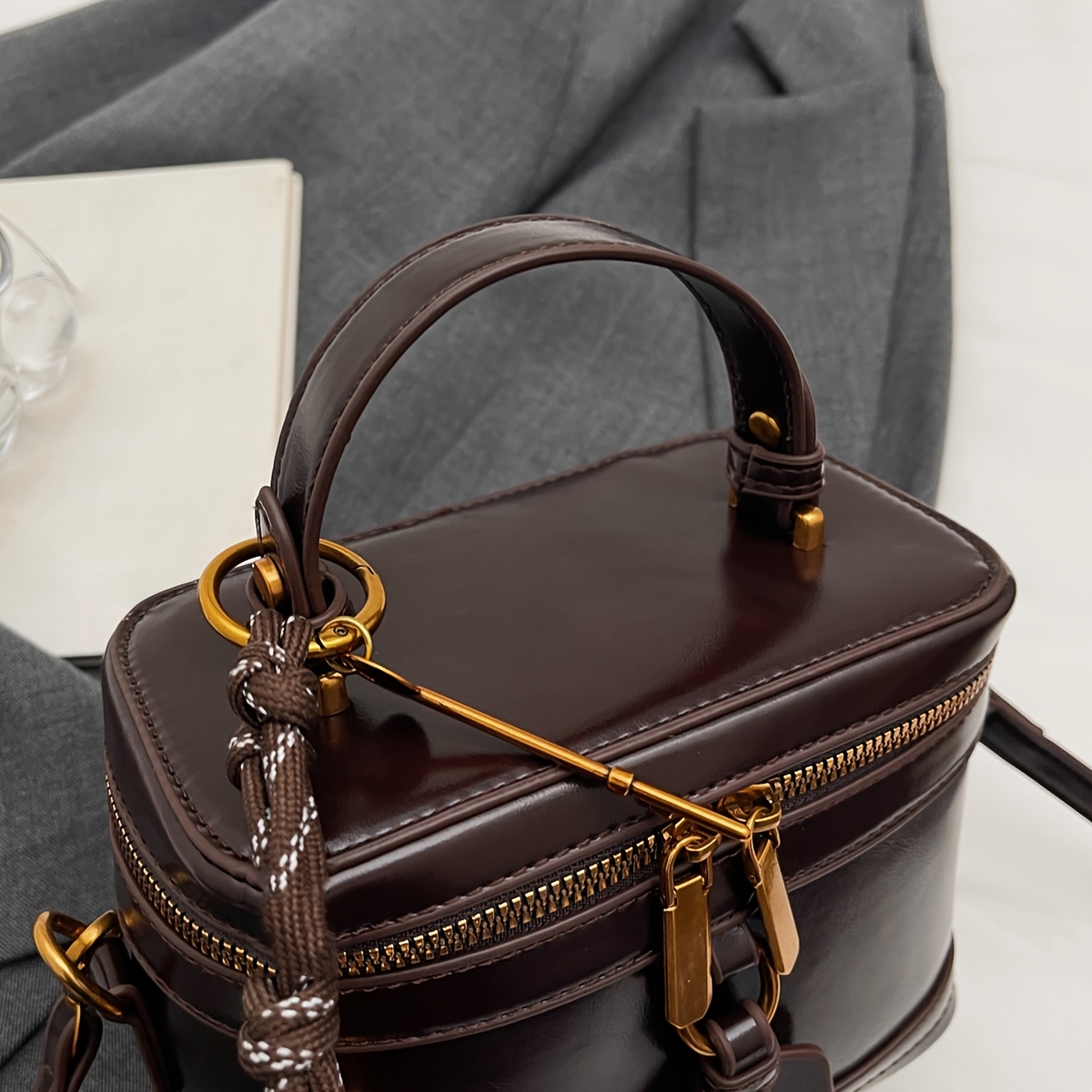 Elegant Retro Women's Crossbody Bag with Bell Pendant – Stylish Brown Handbag with Adjustable Strap, Zipper Closure, and Golden-Tone Hardware for Work, Date, Shop, and Party