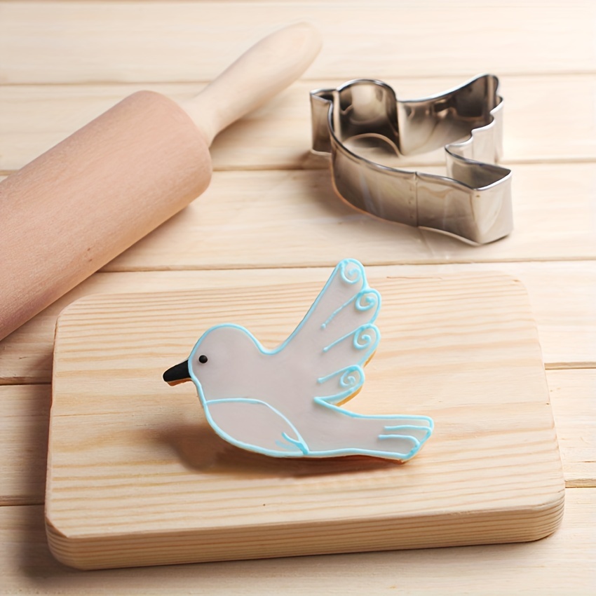 

A Piece Of Stainless Steel Diy Biscuit Mold In The Shape Of A Bird