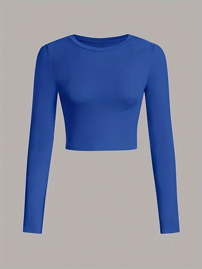 A women's long sleeve crop top sold by 100 Spartans