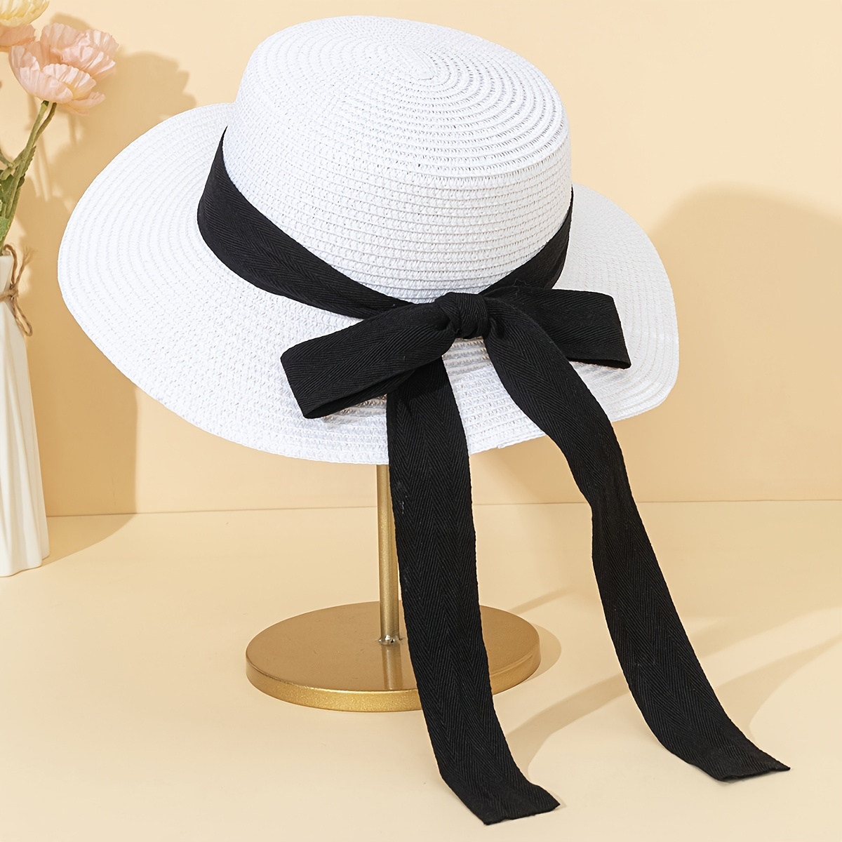 1 elegant black and white straw hat with floral accent  display picture 3