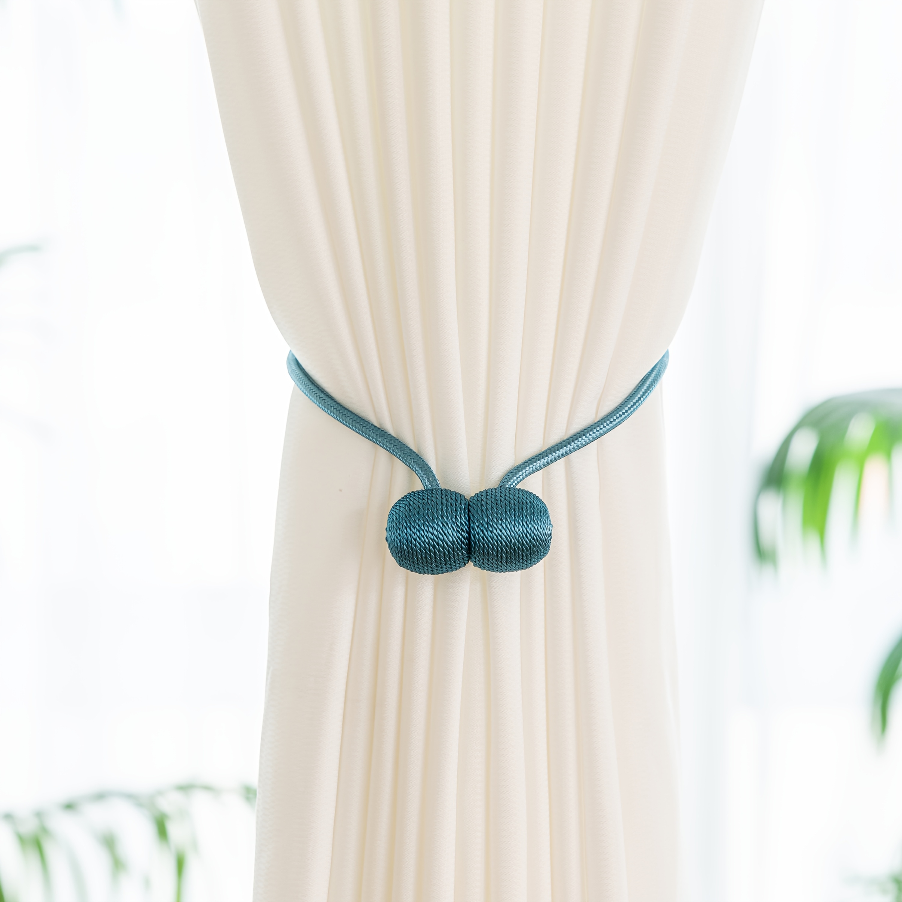 A Set of Two Modern Minimalist Magnetic Curtain Ties Is on, Featuring Thicker Twisted Ropes And Flexible Magnetic Ties. They Are Durable, Easy to Install, And Do Not Require Drilling, Making Them Perfect for Bedroom And Living Room Decor