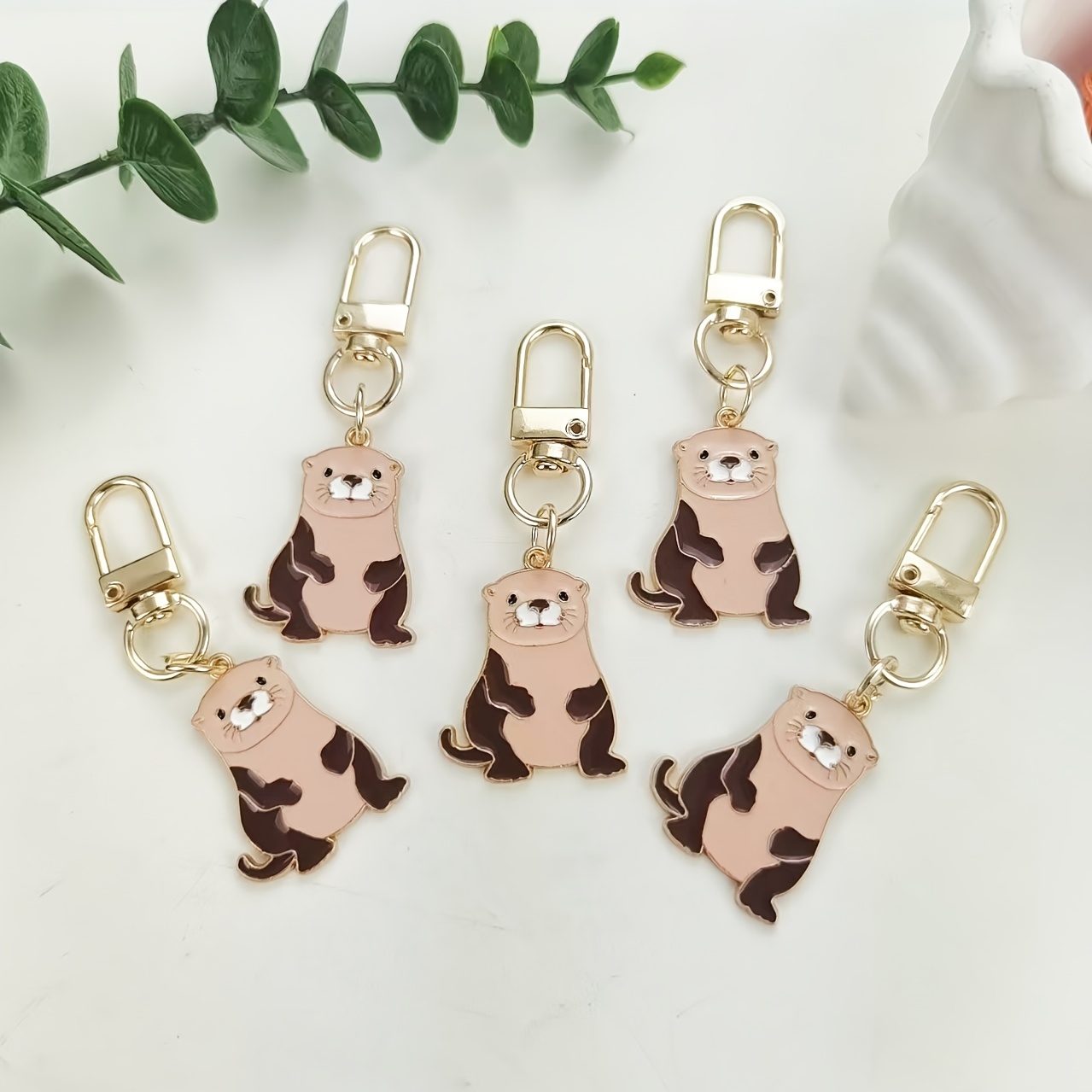 Image of 5pcs , Fashionable, Realistic And Cute Otter Keychain Gifts For At Birthday Parties: Unisex Clothing, Car Keys, And Animal Pendants As Commemorative Gifts For The Holiday Party