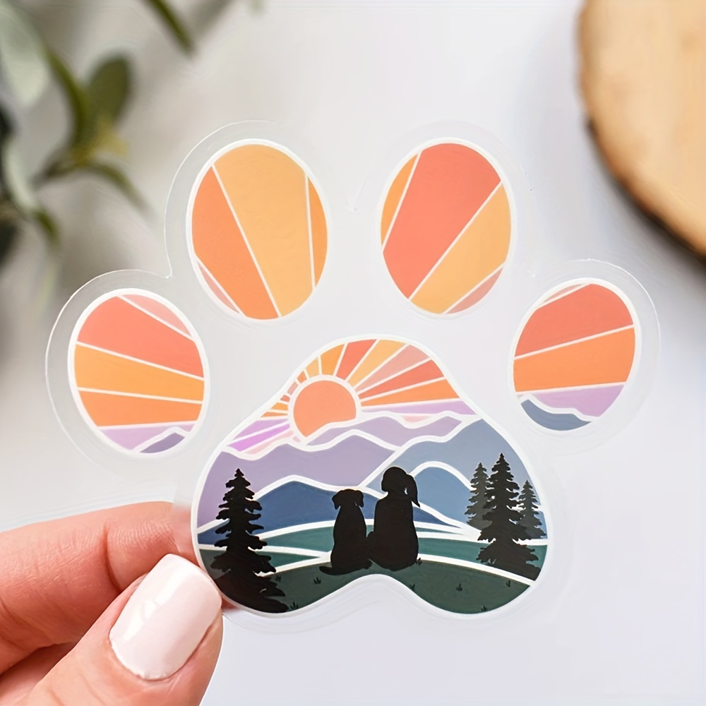 

Transparent Vinyl Dog Paw Print Sticker With Mountain And Girl With Dog Design For Laptops, Water Bottles, And Outdoor Adventure Gifts