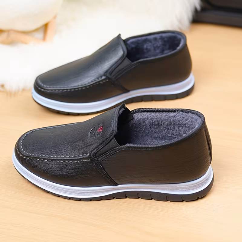 mens winter boots slip on ankle boots with a flat design black insulated footwear featuring thickened warm lining low heeled round toe non slip solid color minimalist style outdoor pvc sole hiking shoes Product details 12