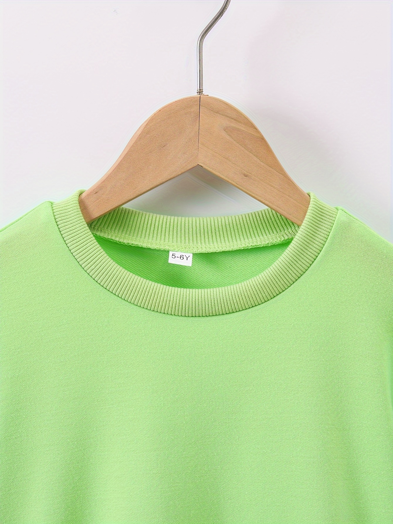 lime green oversized sweatshirt letter a ladybug floral Temu