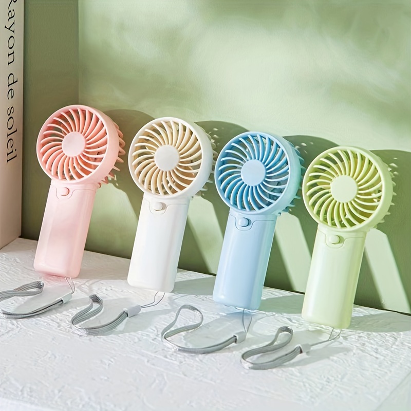

Battery Operated Mini Portable Fan, Lightweight Handheld Fan - Ideal For Office, Outdoor, Traveling And Camping -stay Cool Anytime, Anywhere! (reguires Aaa Batteries, Not Included)