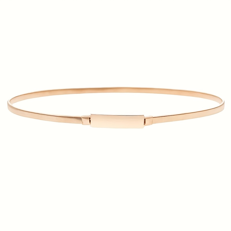 E-shop Ein schlanker, dünner elastischer Gürtel für Damen, mit einem goldenen Design, das sich zu Kleidern und Jeans gut eignet.