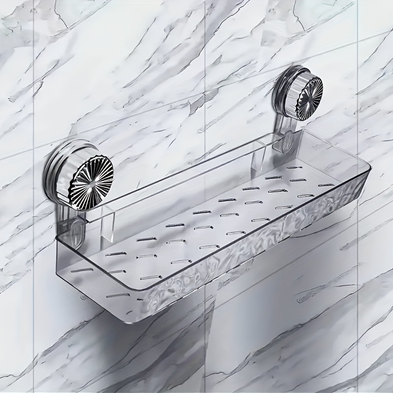 wall mounted bathroom shelf no drilling required   with a strong suction cup base and drainage holes clean hygienic safe sturdy and reliable thick transparent plastic storage rack suitable for storing toiletries skincare products