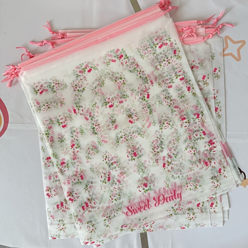 TEMU Bolsa de almacenamiento de plástico impermeable rosa con cordón y estampado floral - Engrosada, adecuada para ropa, zapatos, organizador para