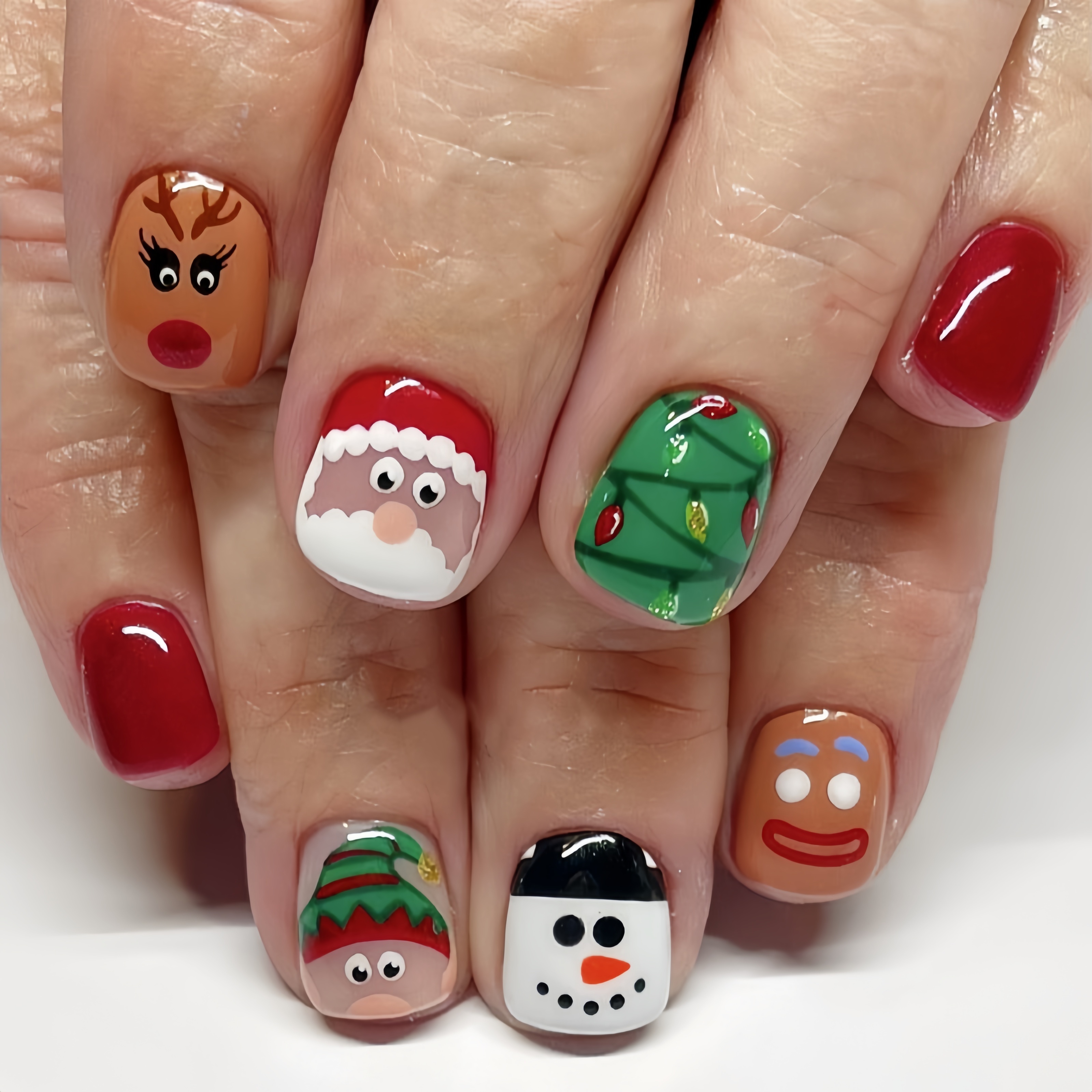 Image of Christmas Nail Art Short Christmas Nail Art Santa Claus Snowman Reindeer Pattern Press-on Nails Removable 24pcs Nail Art Christmas Nail Stickers