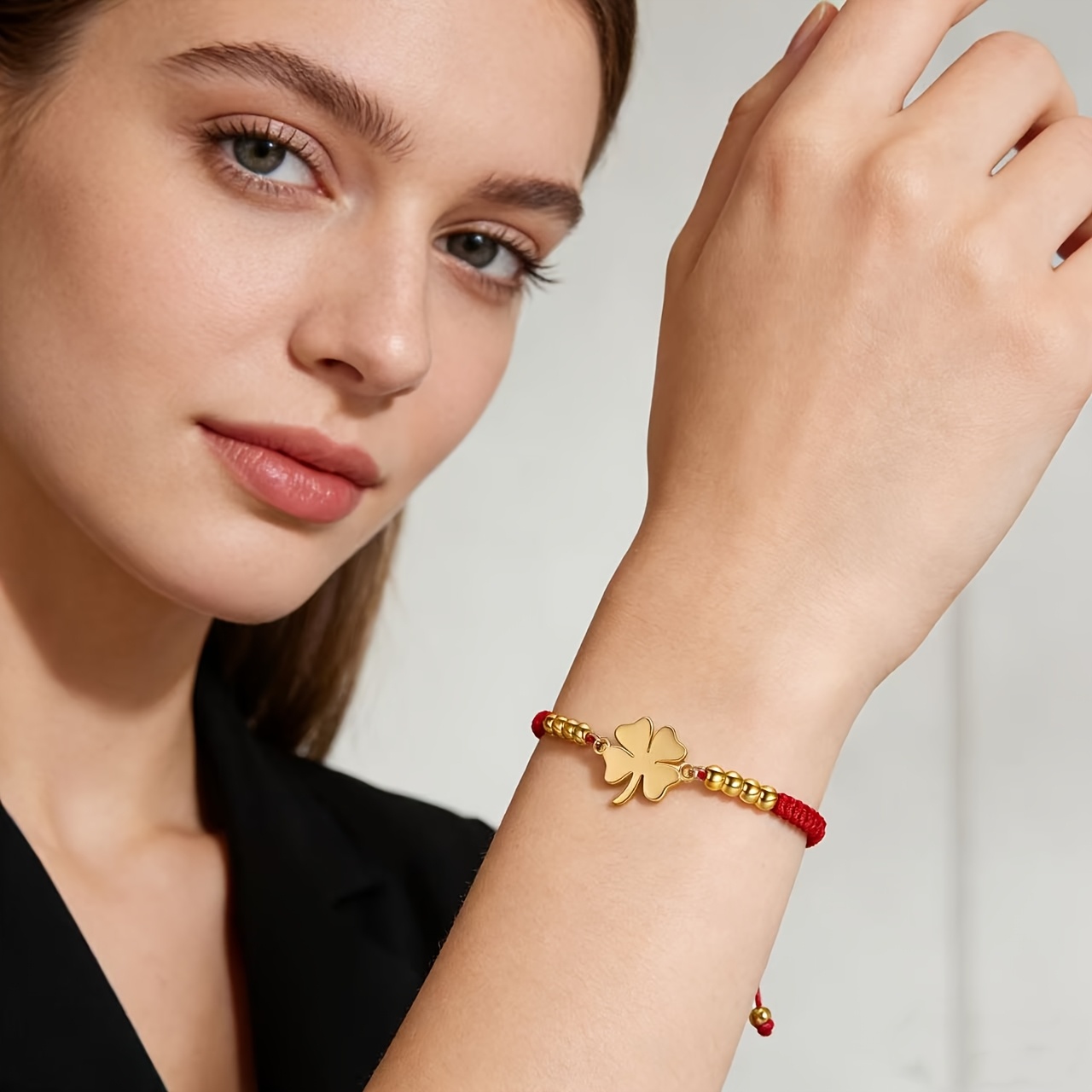 Red/Black Braided Rope Bracelet with Golden Clover Pendant