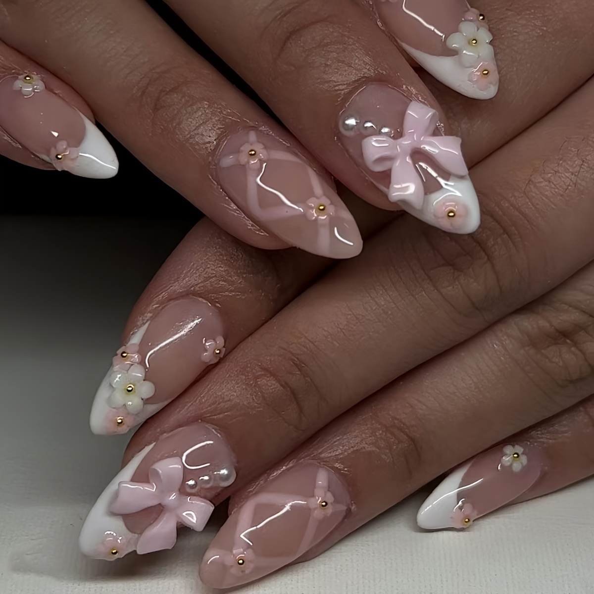 

Pink Almond Press-on Nails With Pearl Flowers And French Tip Design - Perfect For A Ballet-inspired Look