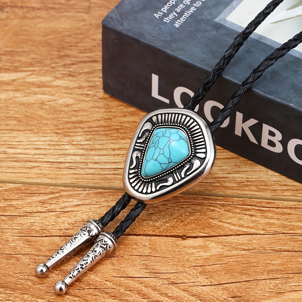 

Southwestern Turquoise Bolo Tie, Silvery Floral Pattern, Inverted Teardrop, Fashion Accessory With Braided Cord