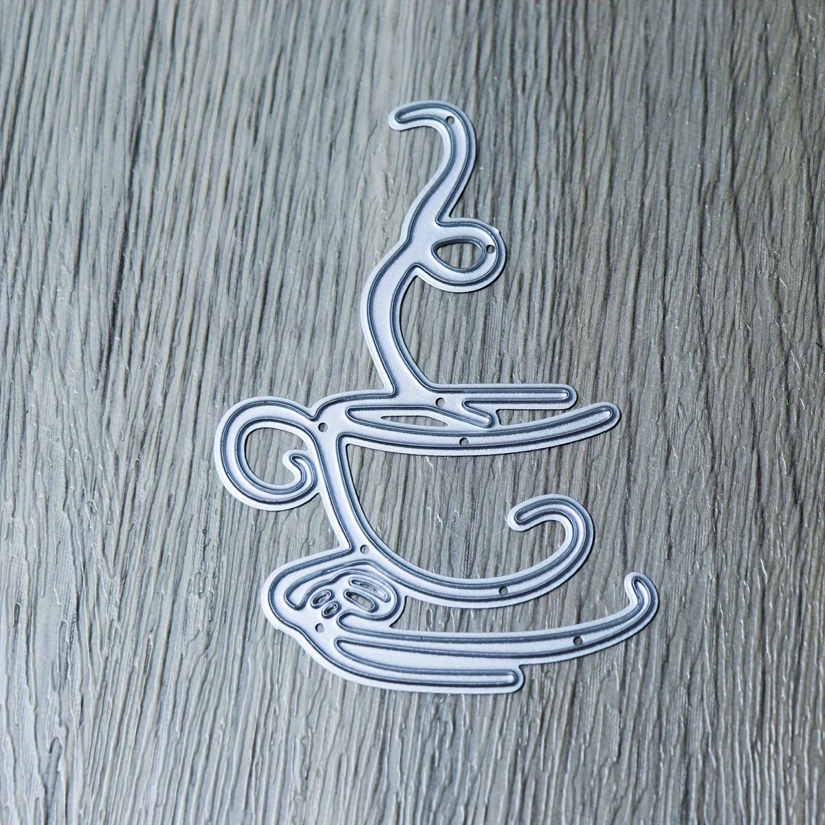 A Metal Cutting And Embossing Die For A Coffee Cup