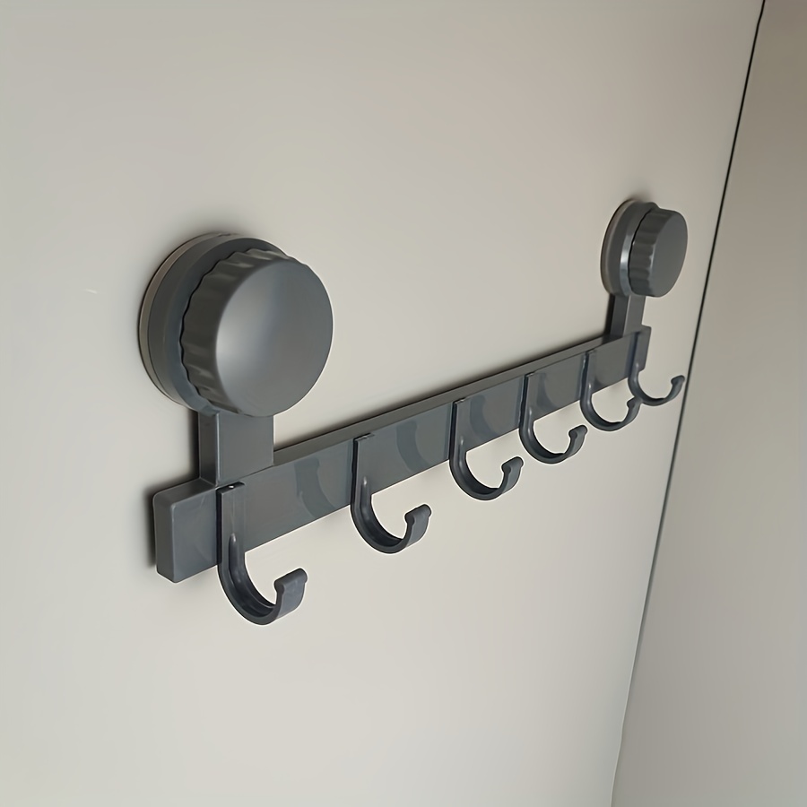 a very practical 6 hook hook that does not   punching suction cups for wall hanging   used to store clothes towels bathrobes small items etc   suitable for bathrooms bedrooms washrooms living rooms doors  