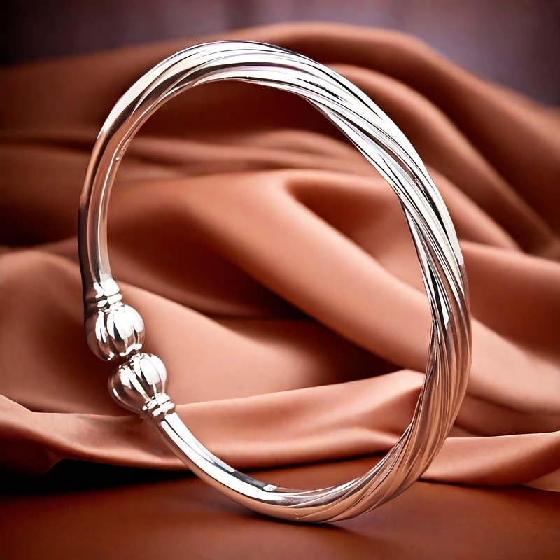 

Foot Silver S999 Bracelet Sterling Silver Bracelet Ladies' Open Bracelet Adjusted In Size To Give Girlfriend Holiday Gifts. Silver Weighs 27 Grams/0.95 Ounces.