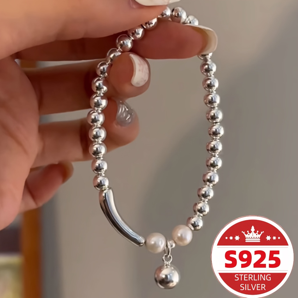 

A Simple And Luxurious Style Of 925 Sterling Silver Beaded Artificial Pearl Bracelet For Women, With , Showcasing A Fashionable Of Women's Jewelry, A Gift For Christmas And New Year.
