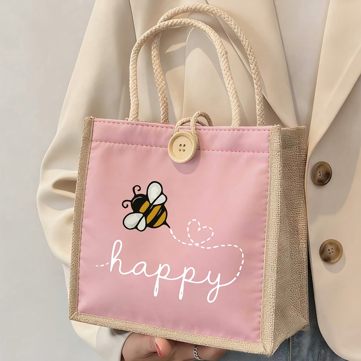 E-shop Diese stylische Damenhandtasche präsentiert ein bezauberndes Bienenmotiv und dient als praktische Aufbewahrungslösung für den . Sie ist für