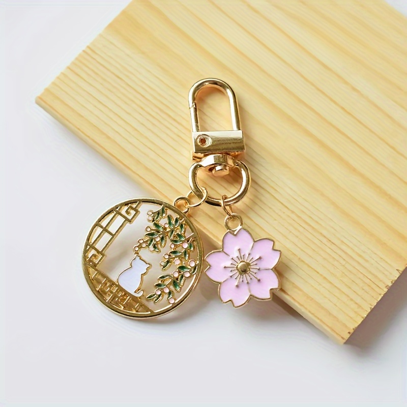 1pc Of Simple, Cute, Sweet, And Cat Keychain Accessory With Pink Floral Cluster And Hollowed-out Featuring A Small Cat