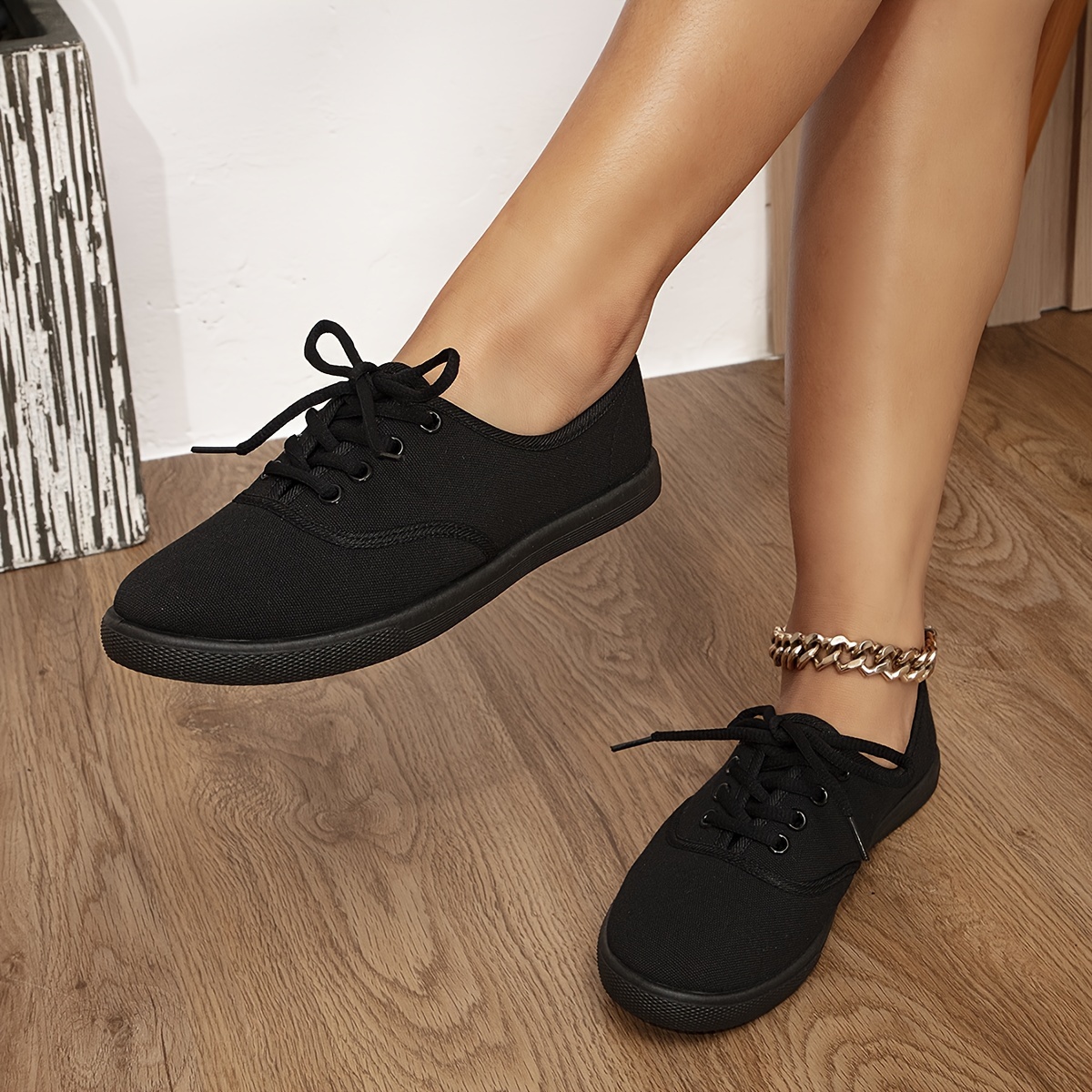 Ladies black fashion canvas trainers